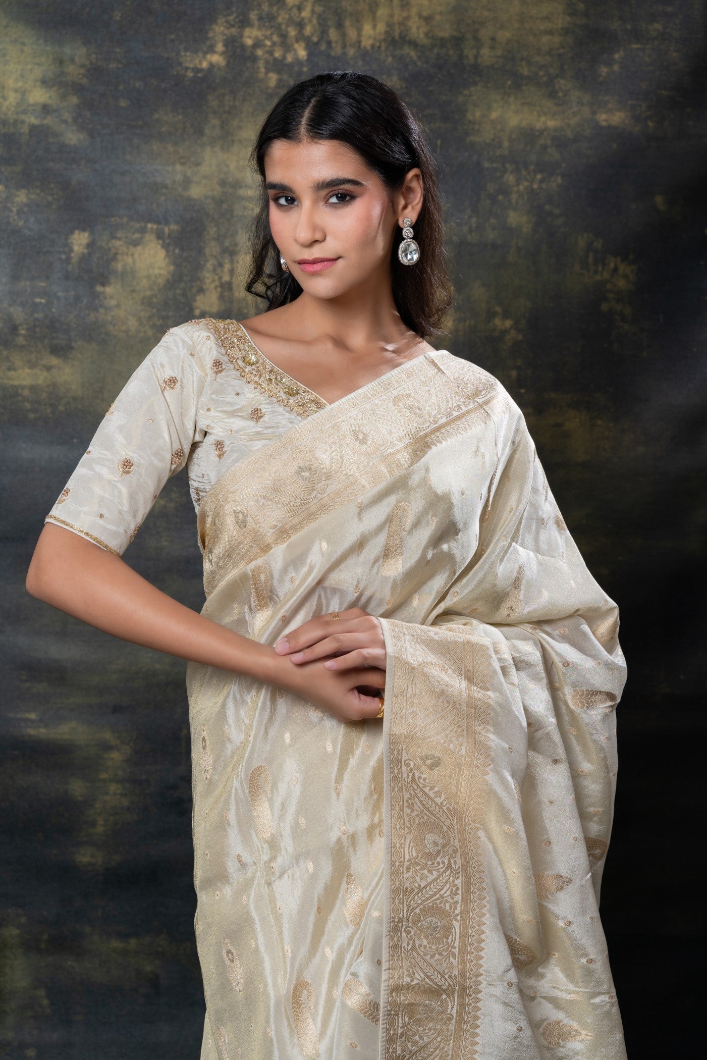 Cream white banarasi silk tissue hand work saree