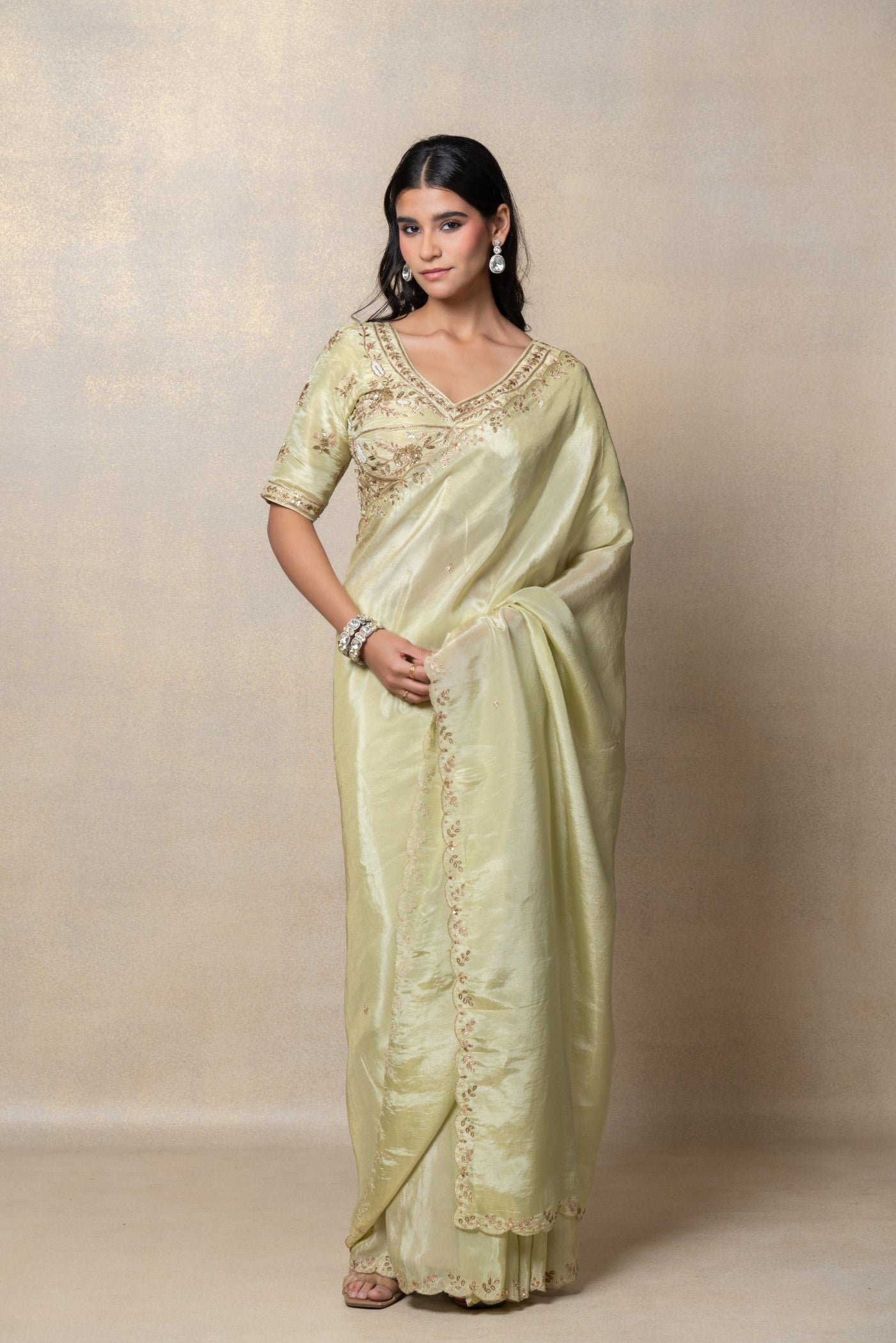 Pista green silk saree with zari embroidery