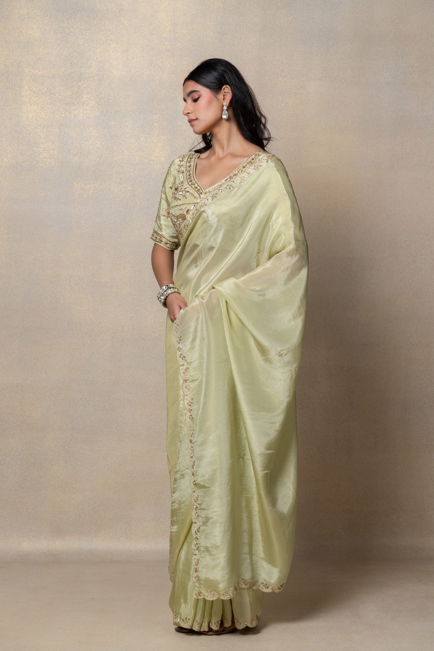 Pista green silk saree with zari embroidery