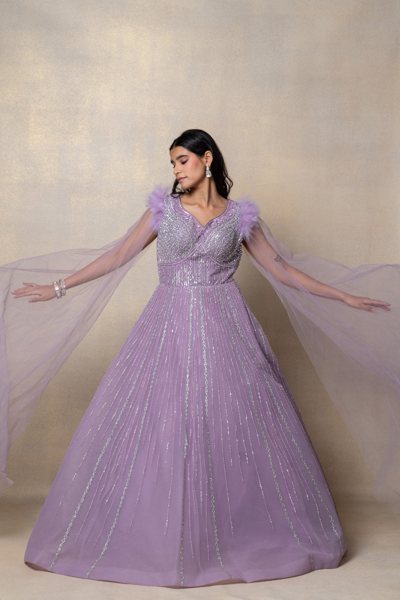 Bright lilac sequinned net gown