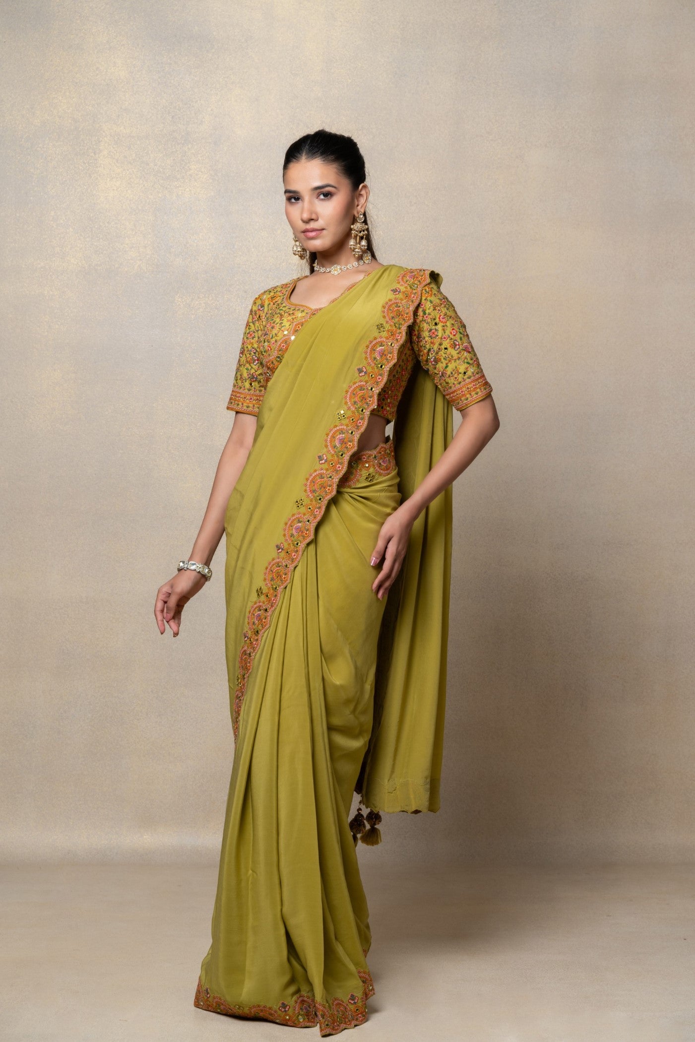 Mehendi green crepe silk resham and mirror embellished saree
