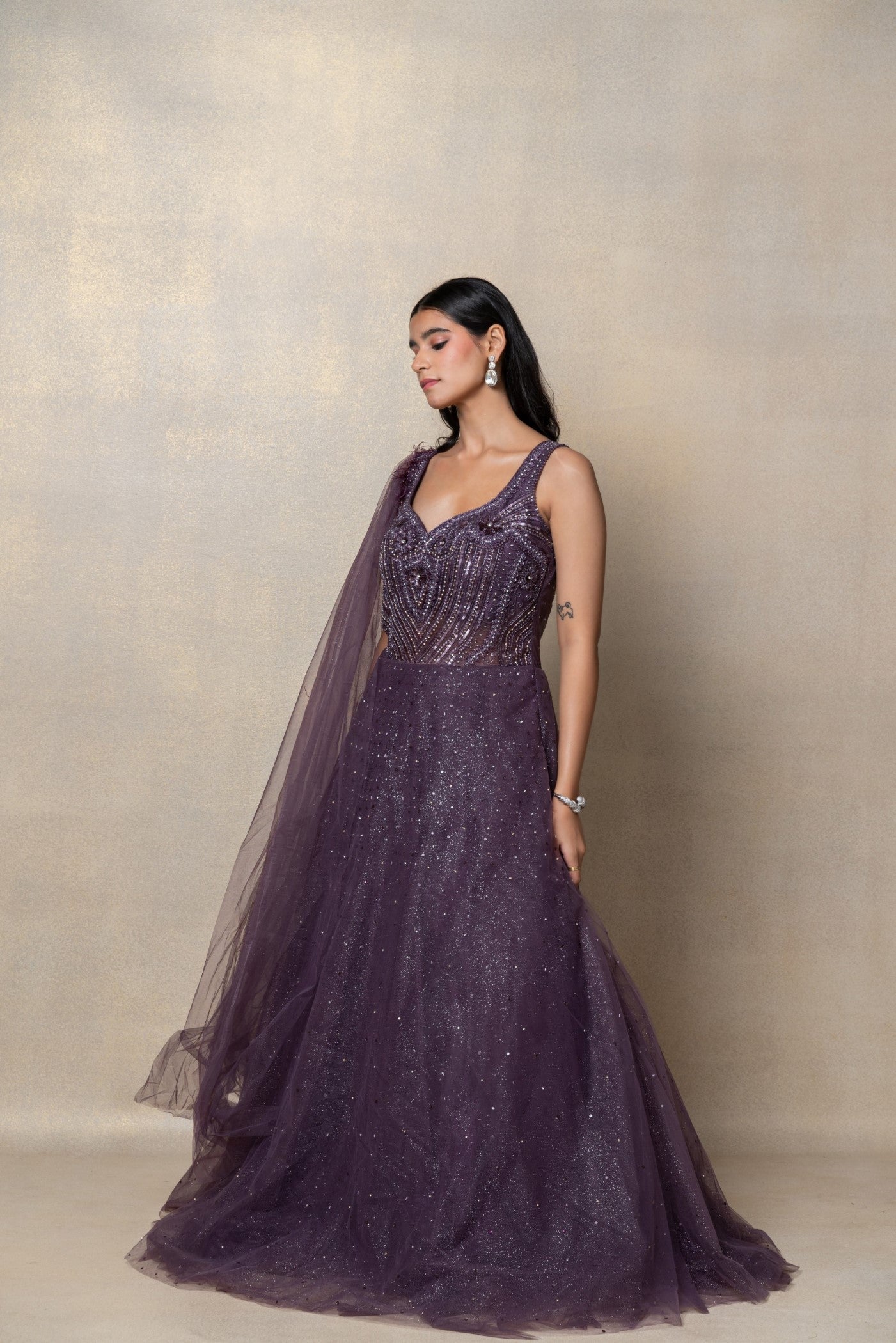 Violet purple sequinned net gown