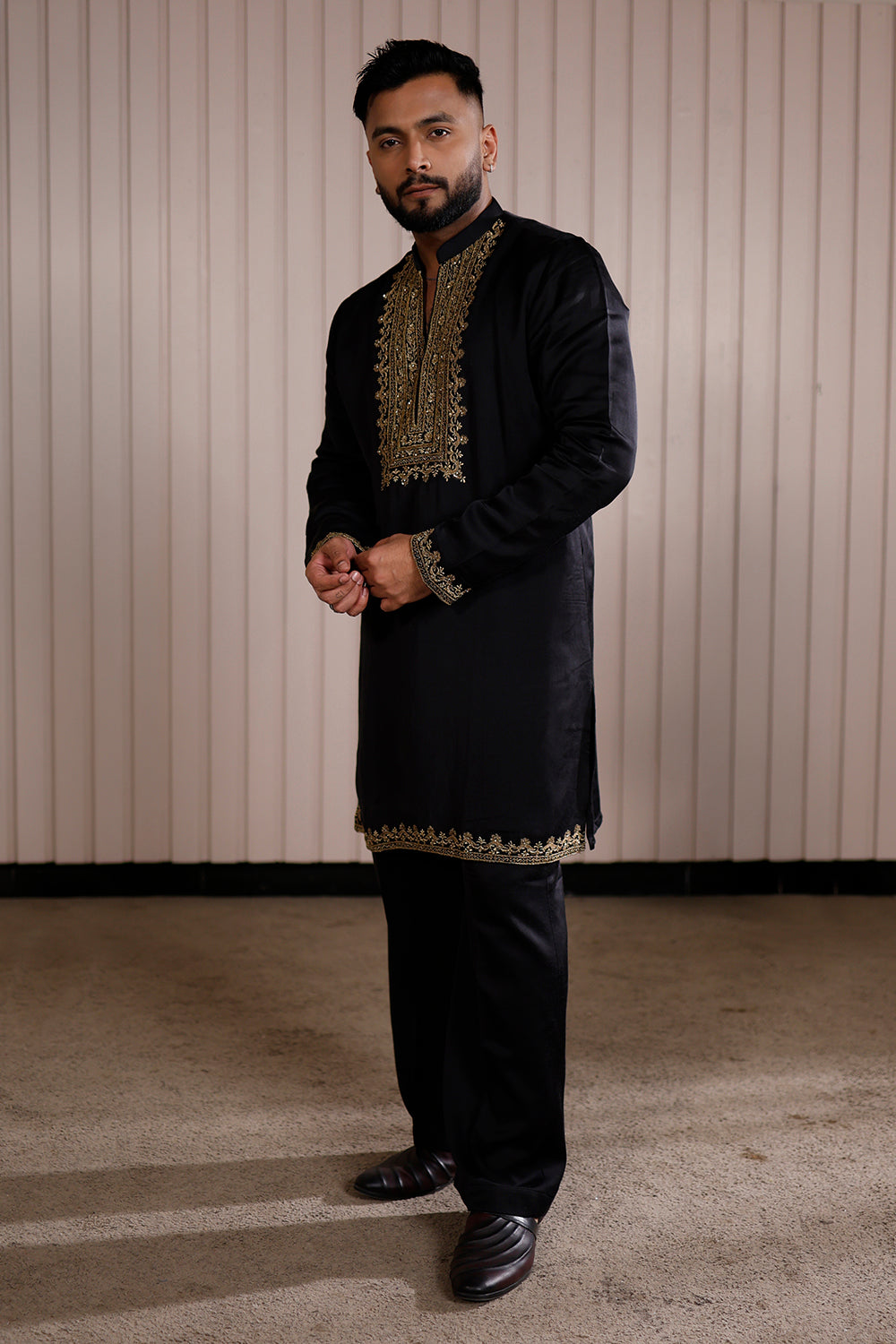 Jet Black Silk Kurta Pajama with Intricate Gold Zari Neckline & Border Work.