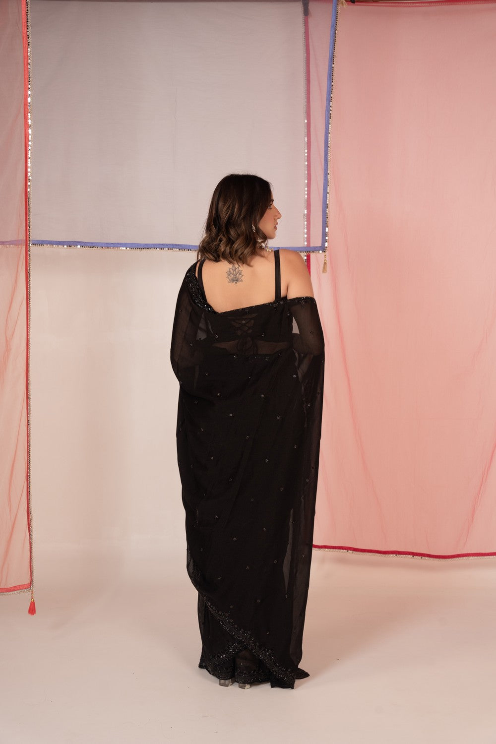 Black tissue silk saree and unstitched blouse piece