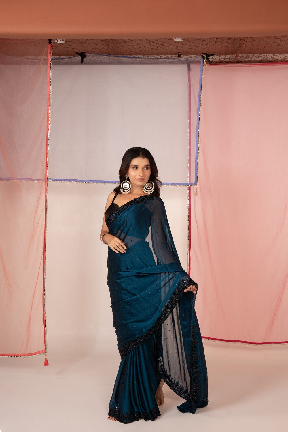 Peacock blue satin silk saree and unstitched blouse piece