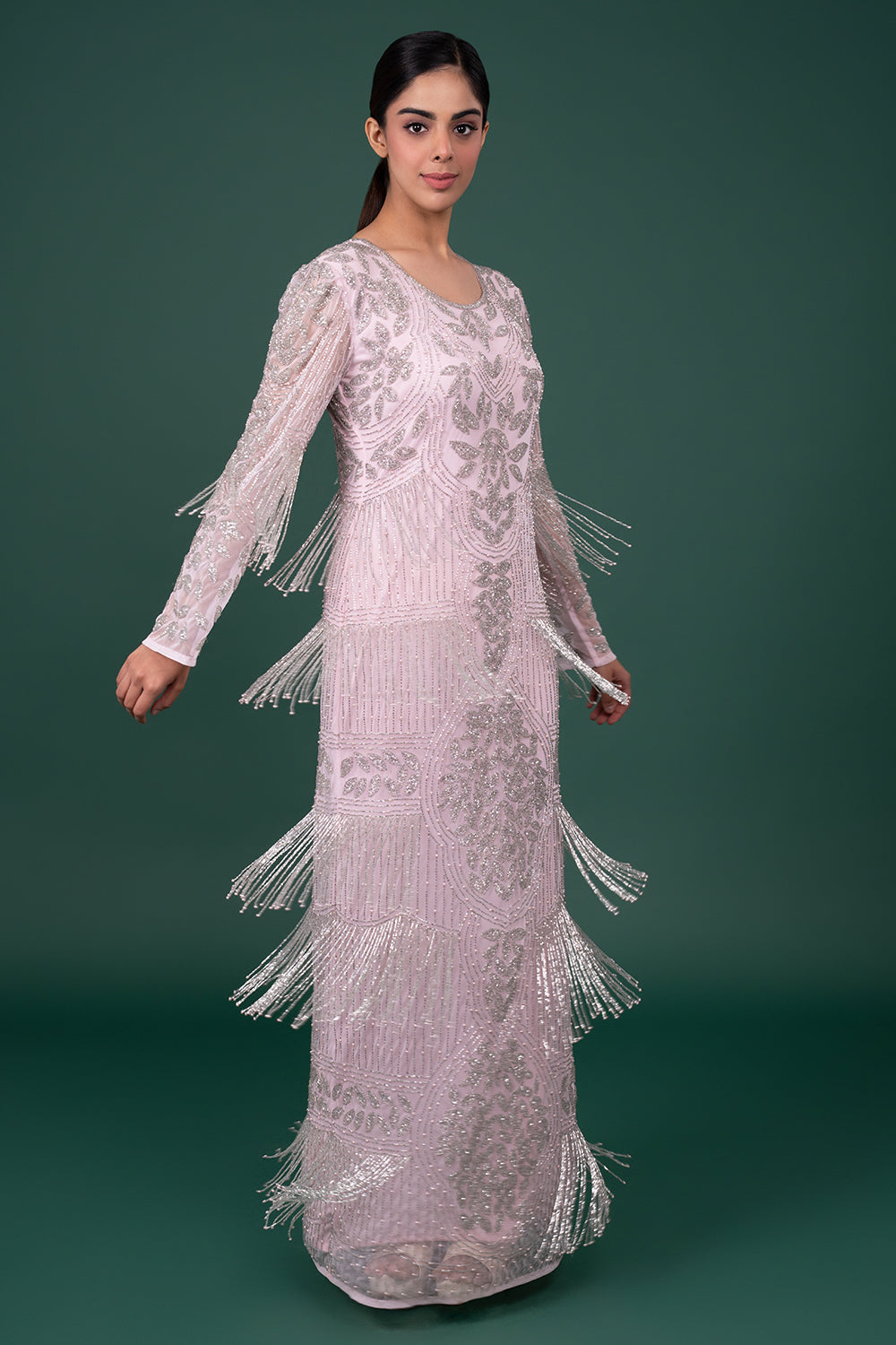 Lavender Tulle Column Gown with Floral Sequin Work and Tiered Bead Fringes.