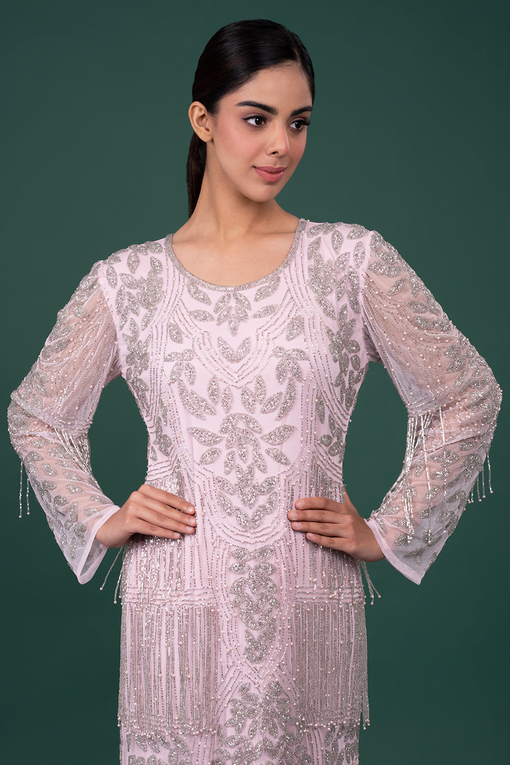 Lavender Tulle Column Gown with Floral Sequin Work and Tiered Bead Fringes.