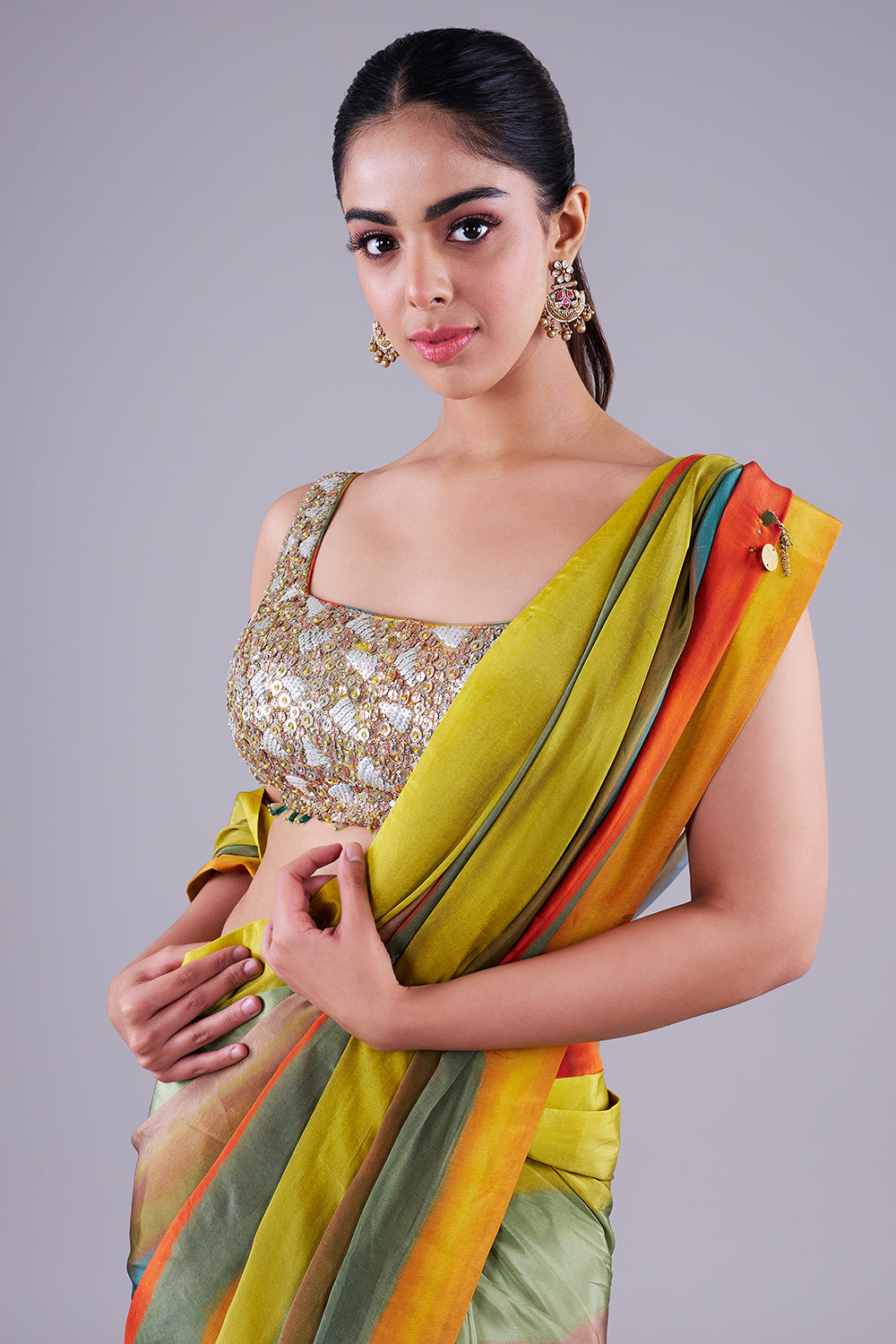 Multi-striped saree with sequin blouse