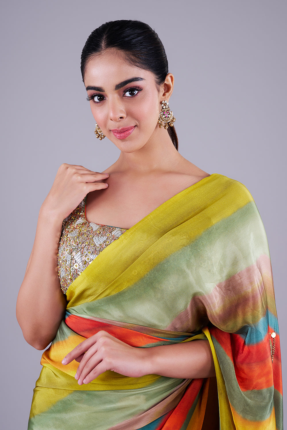 Multi-striped saree with sequin blouse