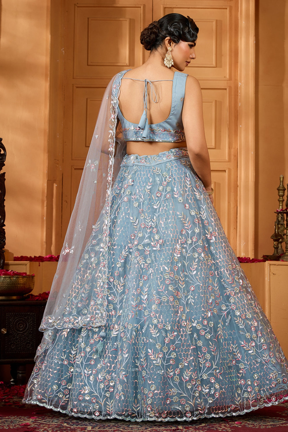 NET LEHENGA CHOLI WITH SEQUINS AND RESHAM EMBROIDERY