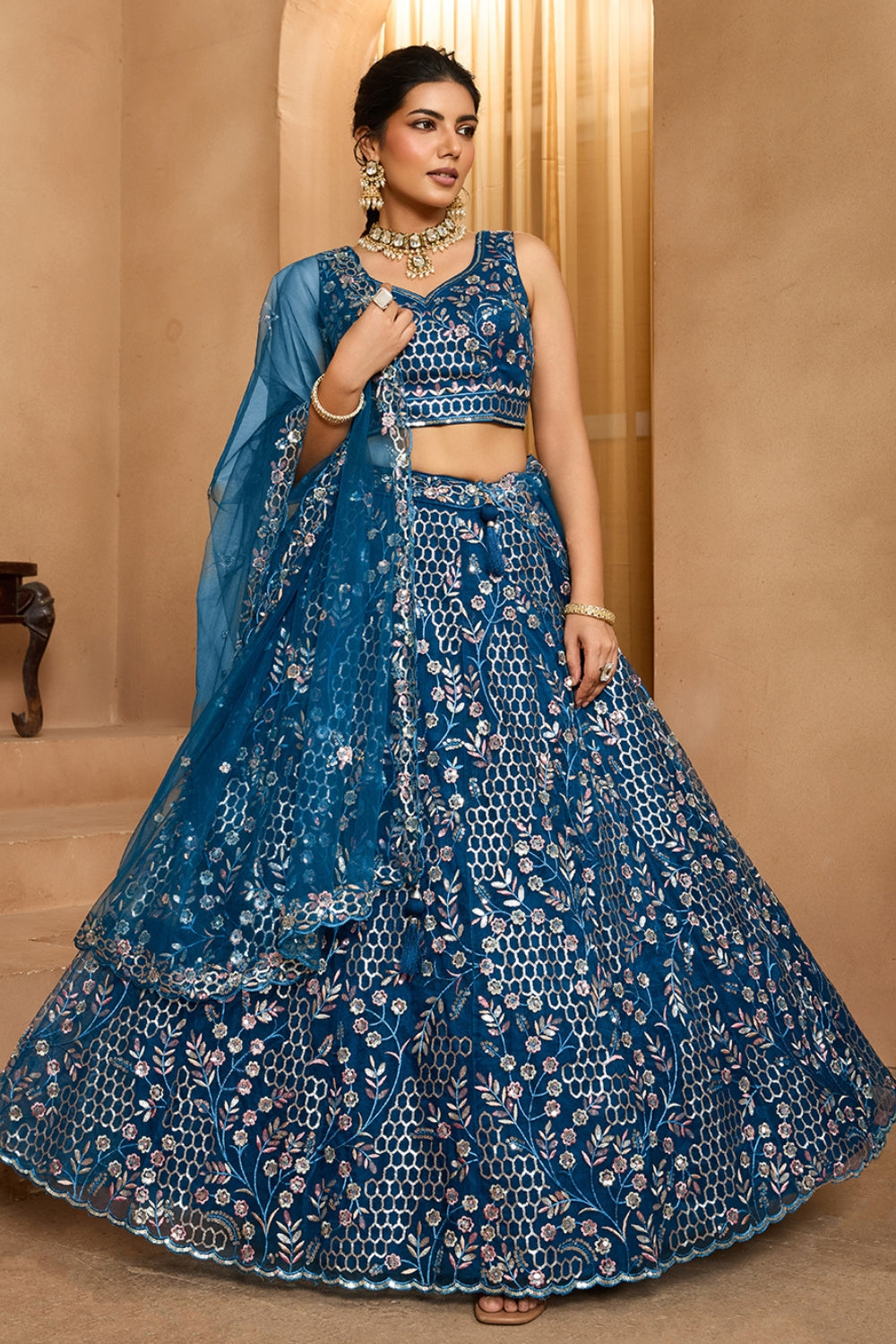 NET LEHENGA CHOLI WITH SEQUINS AND RESHAM EMBROIDERY