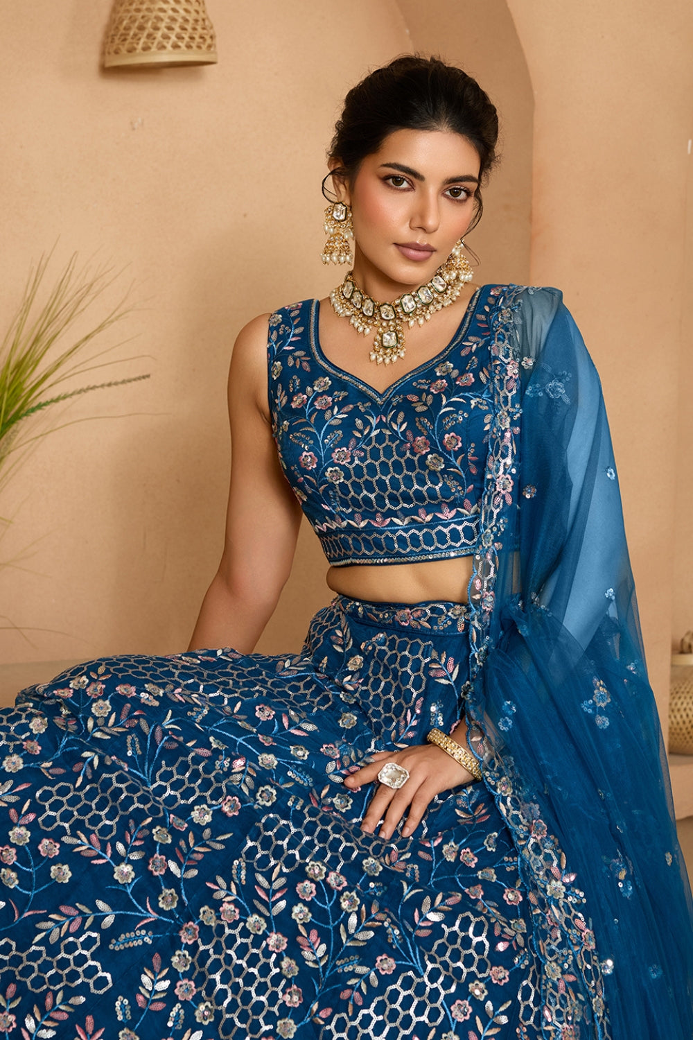 NET LEHENGA CHOLI WITH SEQUINS AND RESHAM EMBROIDERY