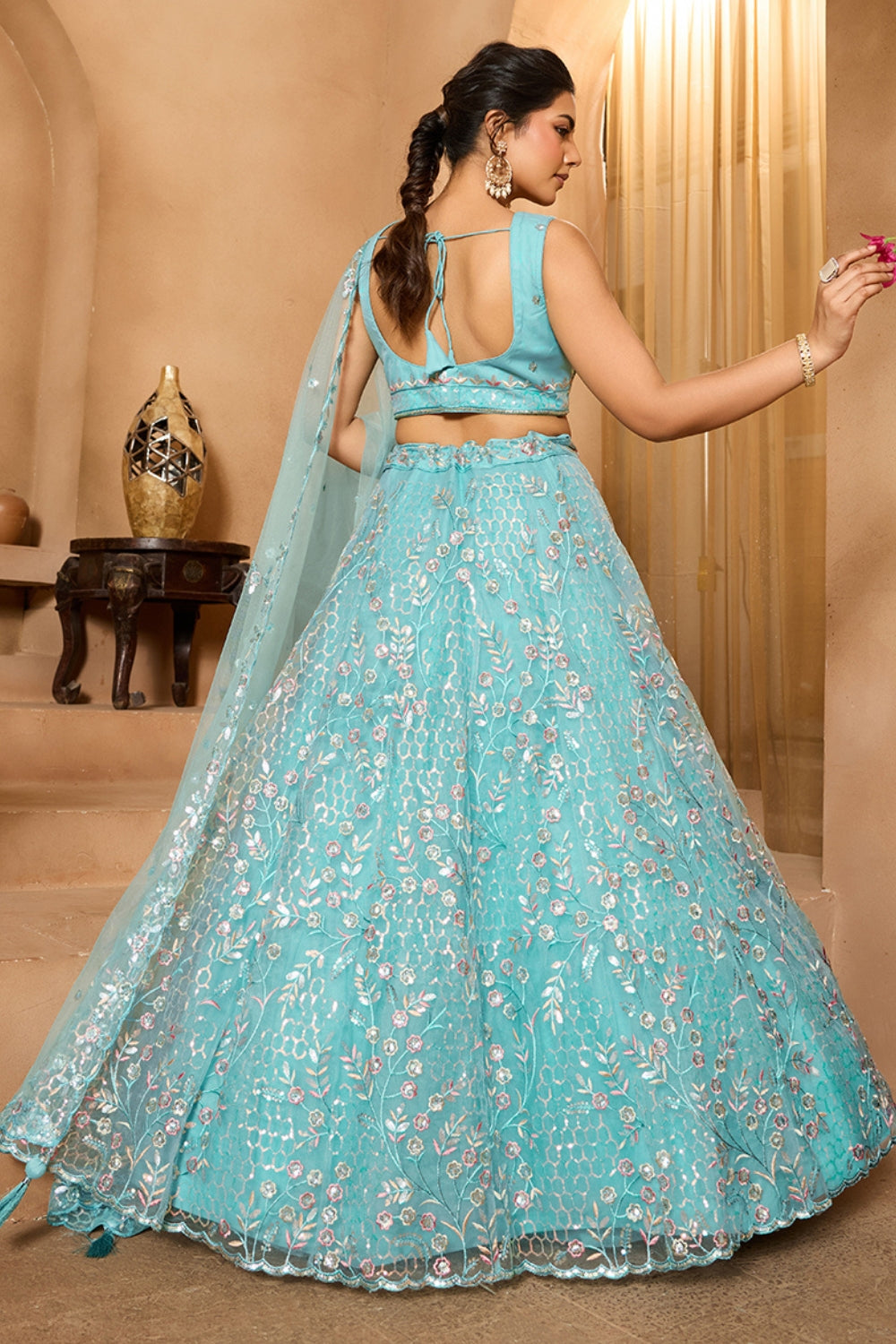 NET LEHENGA CHOLI WITH SEQUINS AND RESHAM EMBROIDERY