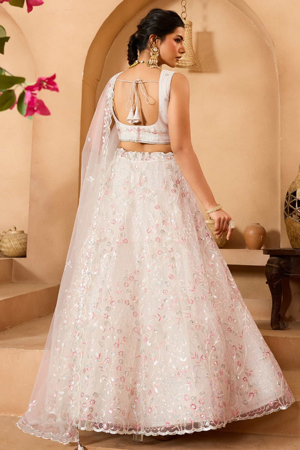 NET LEHENGA CHOLI WITH SEQUINS AND RESHAM EMBROIDERY