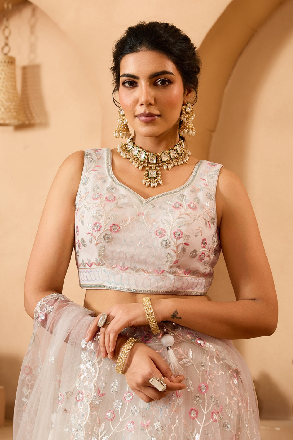 NET LEHENGA CHOLI WITH SEQUINS AND RESHAM EMBROIDERY
