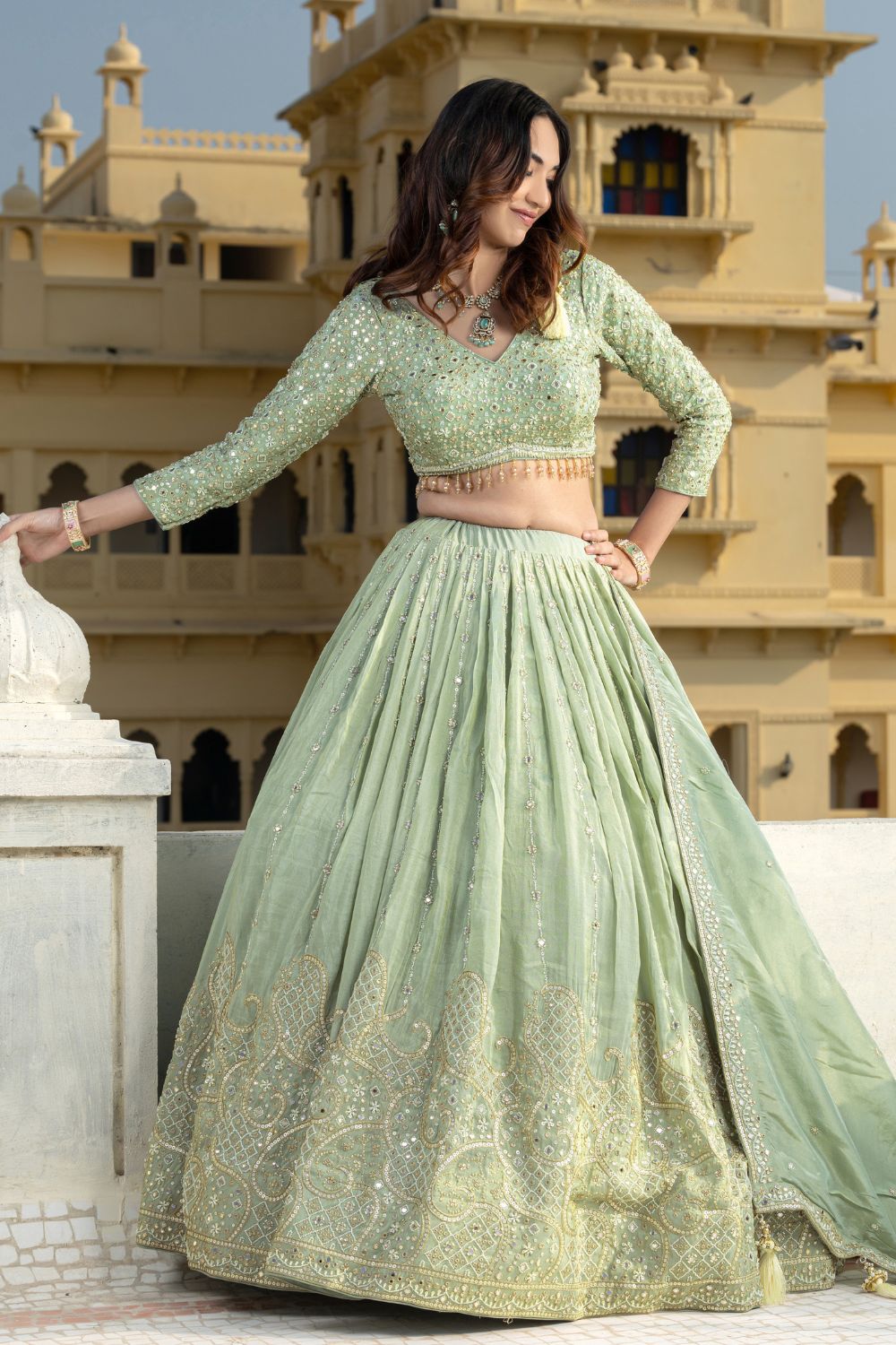 PISTA GREEN TISSUE LEHENGA CHOLI WITH MIRROR AND SEQUINS WORK