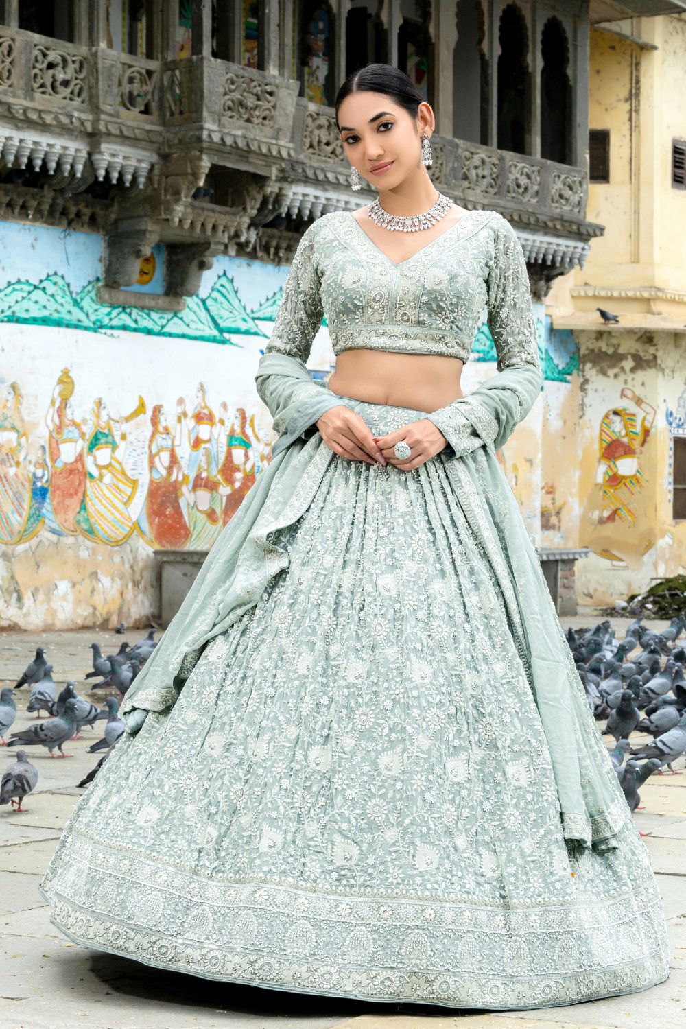 POWDER BLUE GEORGETTE LEHENGA CHOLI WITH CUTDANA AND RESHAM EMBROIDERY