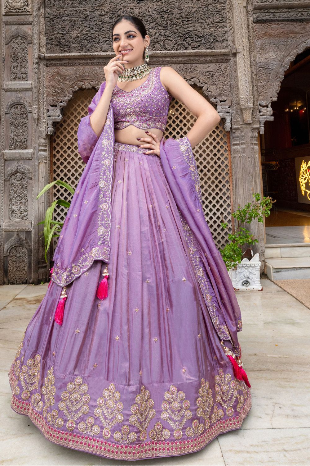 PURPLE TISSUE LEHENGA CHOLI WITH CUTDANA AND SEQUINS WORK