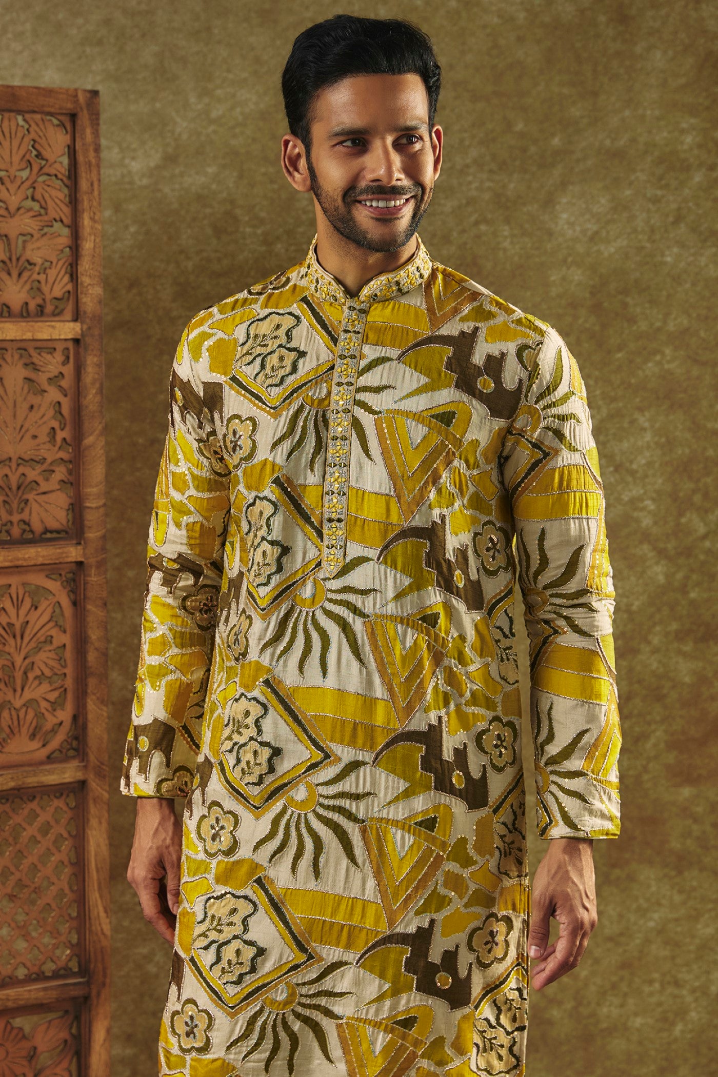 Mustard Yellow Printed Silk kurta pajama set with resham embroidered neck