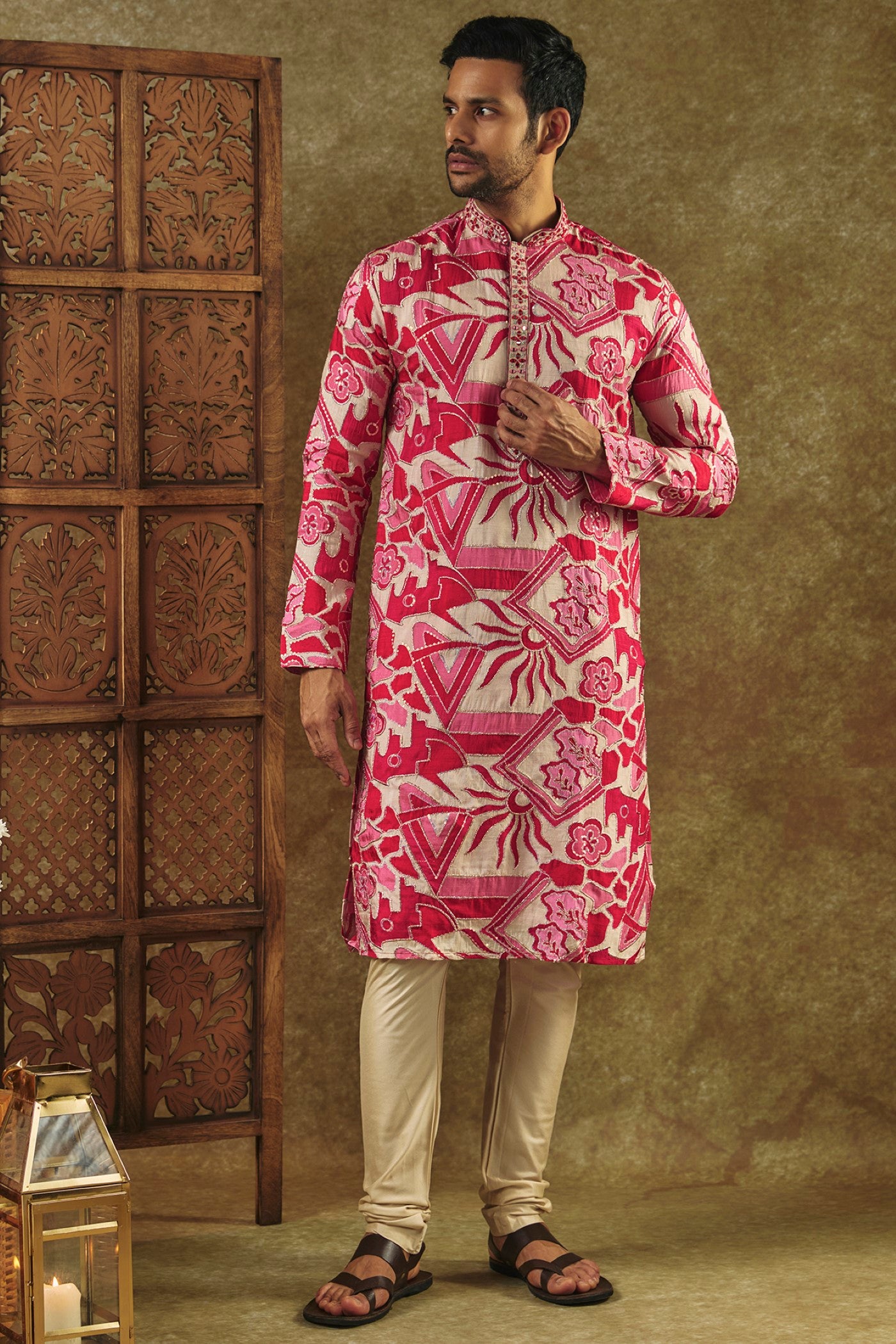 Rani Pink Printed Silk kurta pajama set with resham embroidered neck
