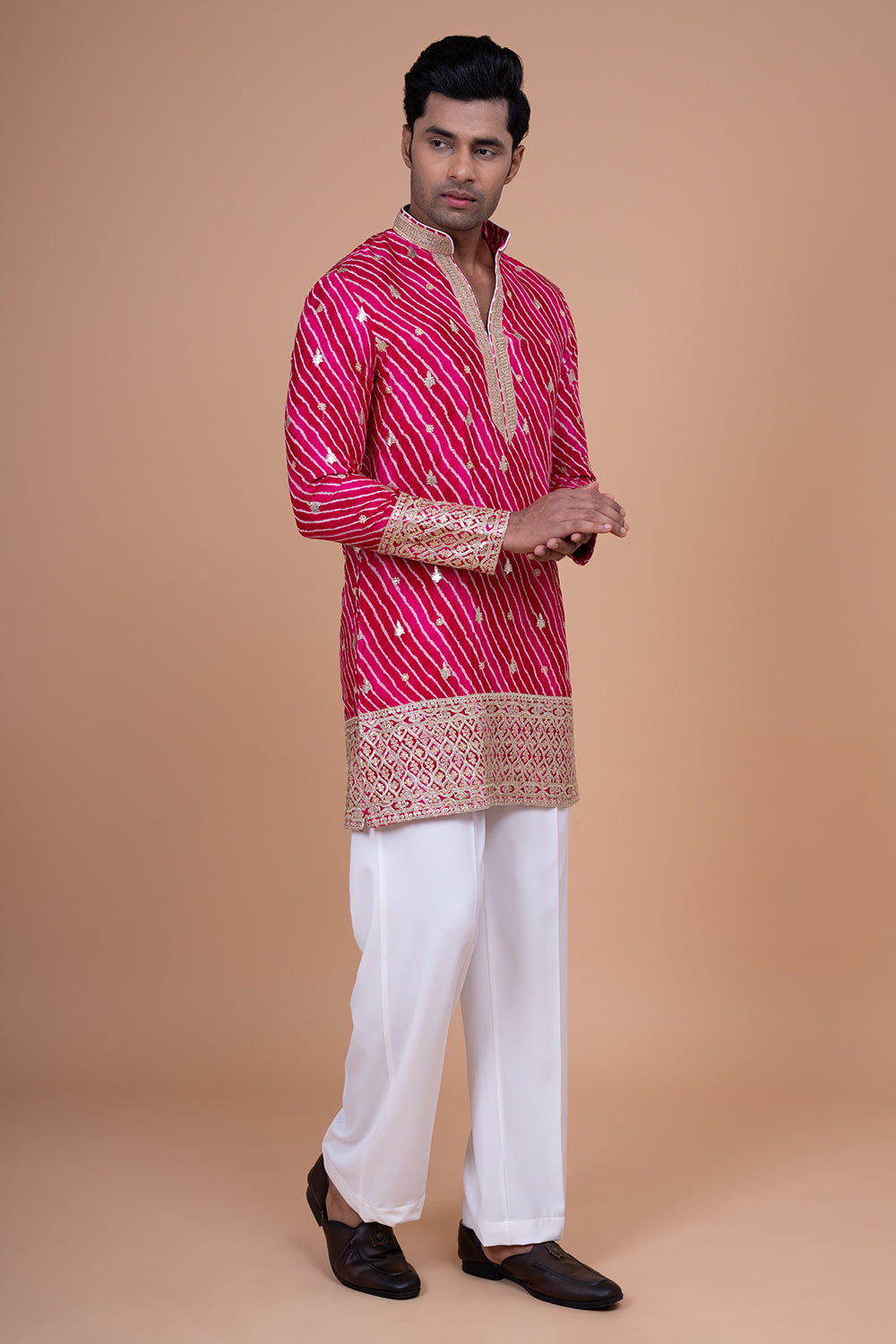Rani Pink Leheriya Kurta with Heavy Gota Patti and Sequin Border.