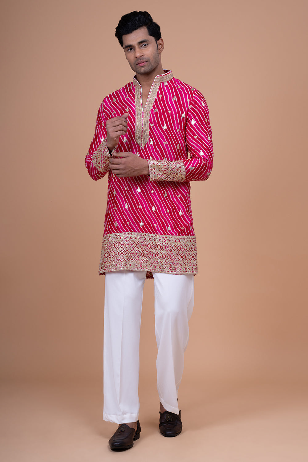 Rani Pink Leheriya Kurta with Heavy Gota Patti and Sequin Border.