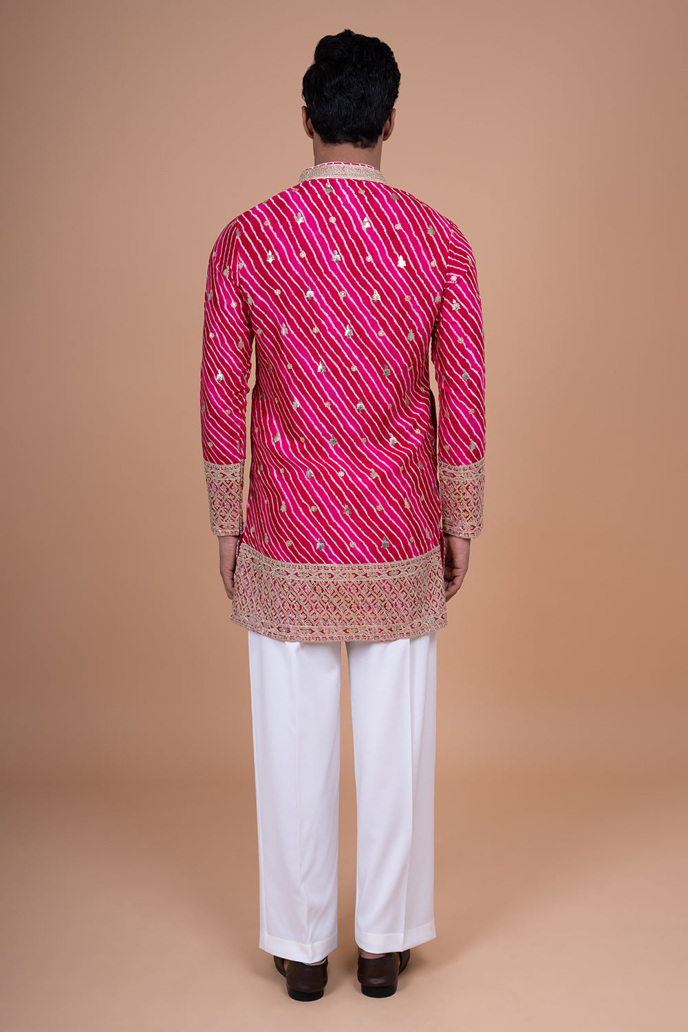 Rani Pink Leheriya Kurta with Heavy Gota Patti and Sequin Border.