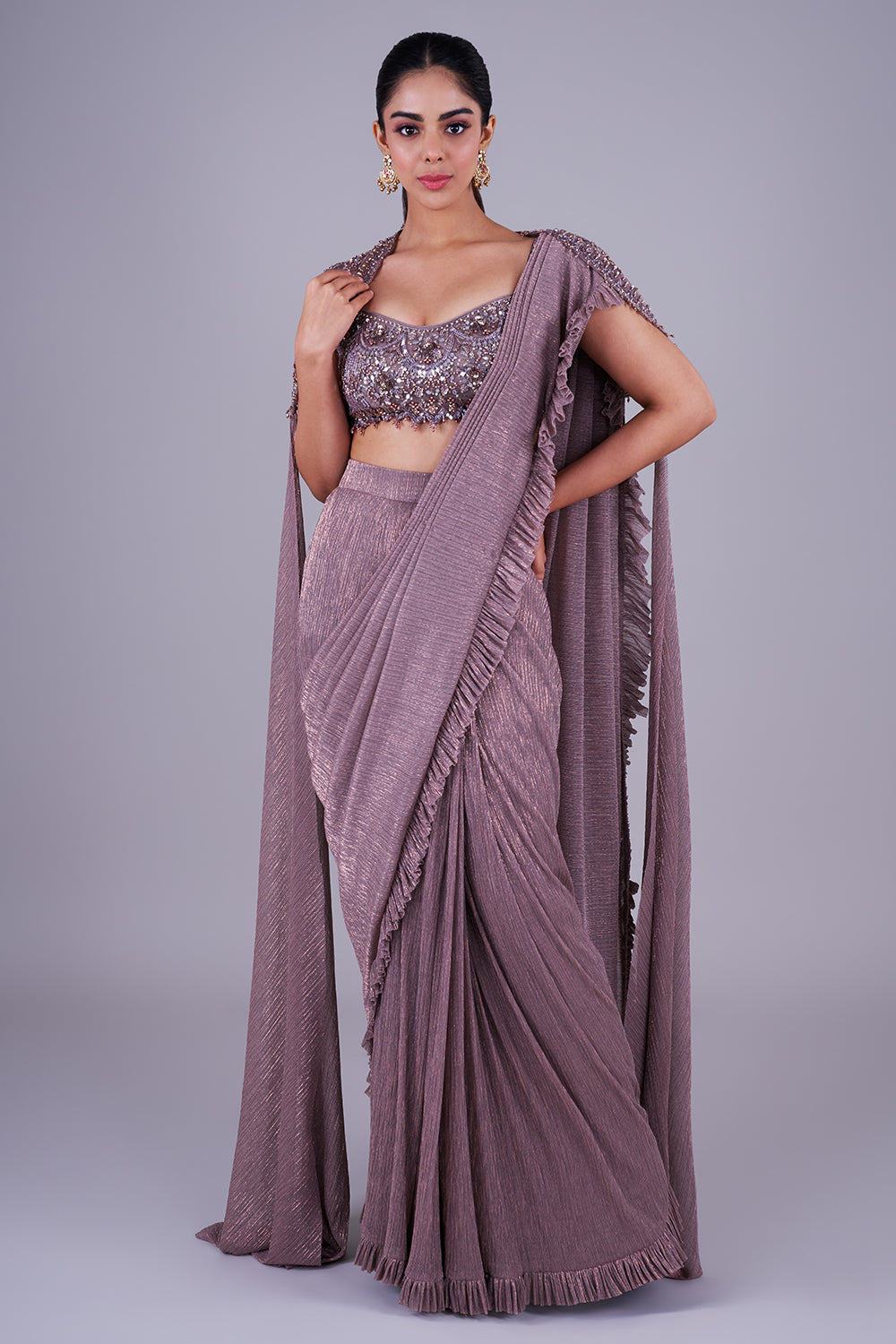 Taupe shimmer saree with embellished blouse & cape