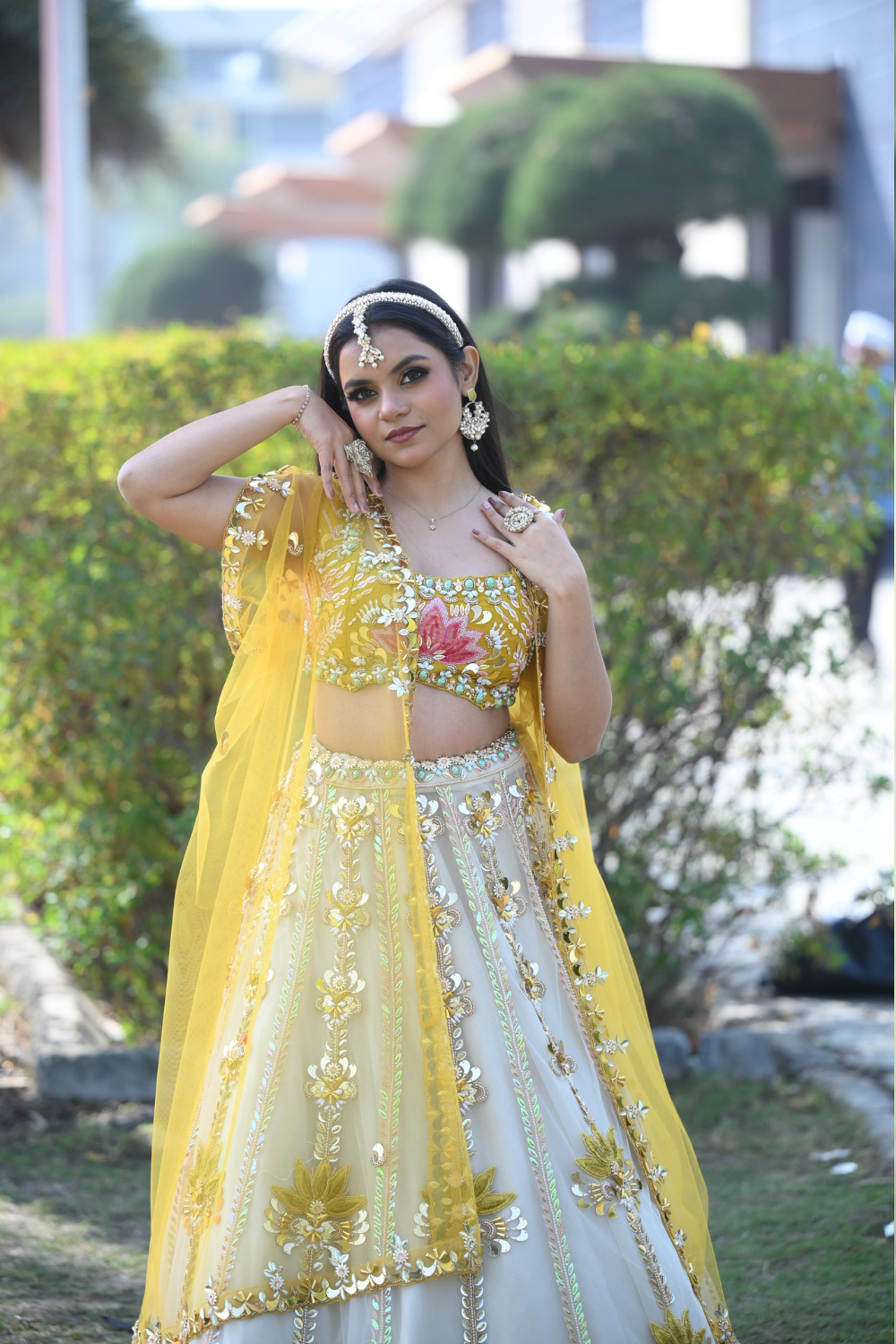 White & yellow lehenga choli with sequins and pearl work