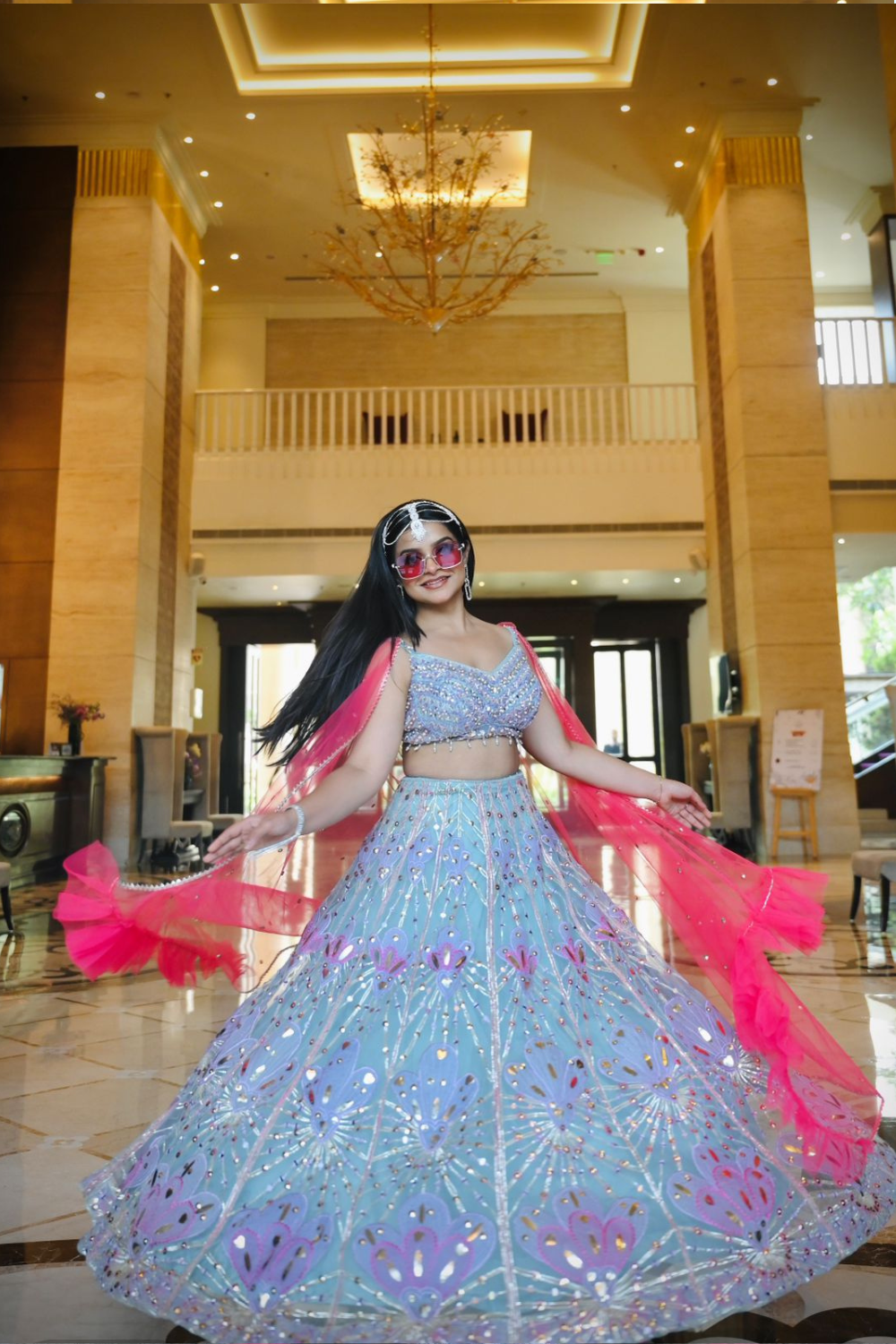 Powder blue net lehenga choli with hand cut dana and mirror work