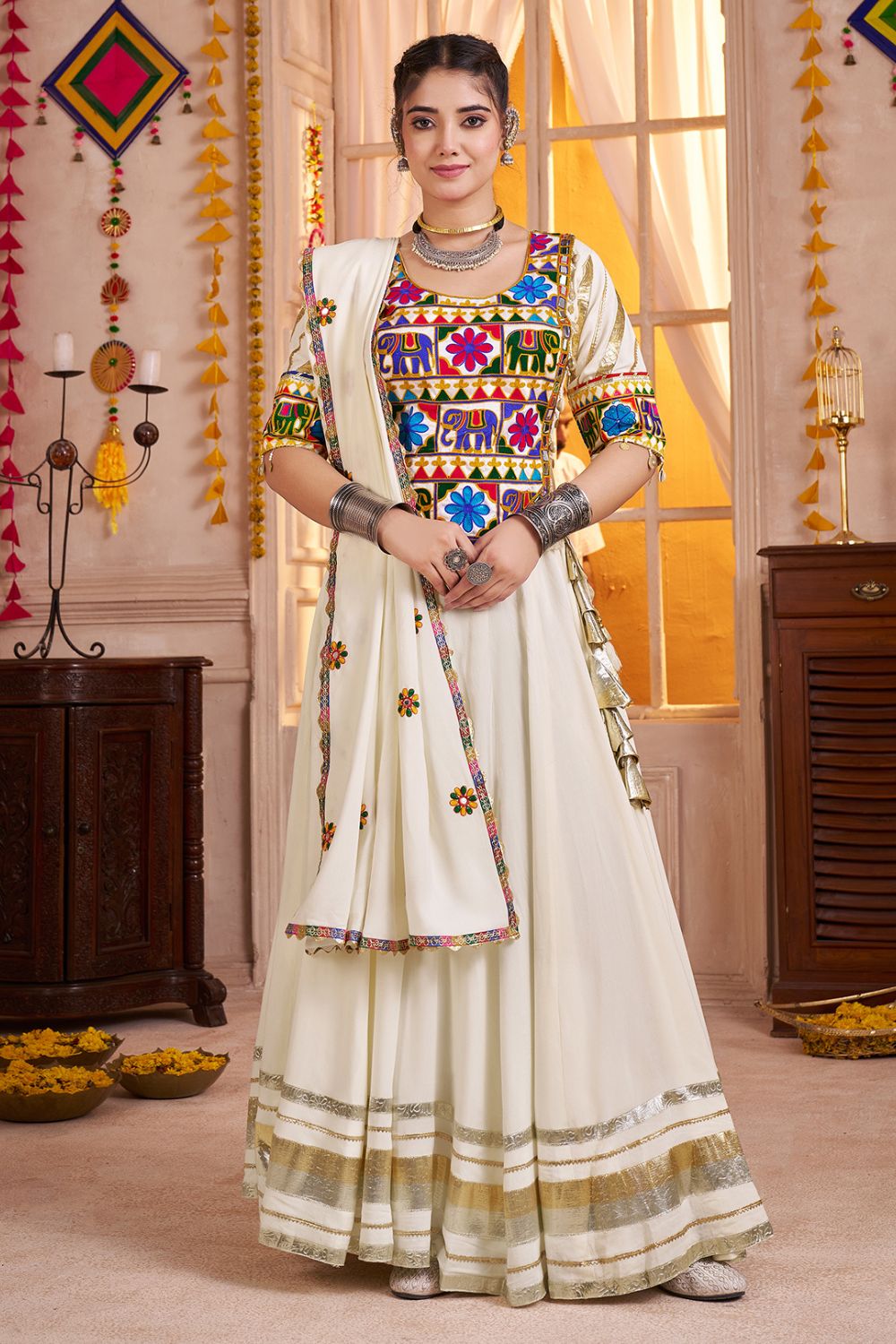 WHITE VISCOSE COTTON LEHENGA CHOLI WITH LAMPI BORDERING AND KUTCHI WORK