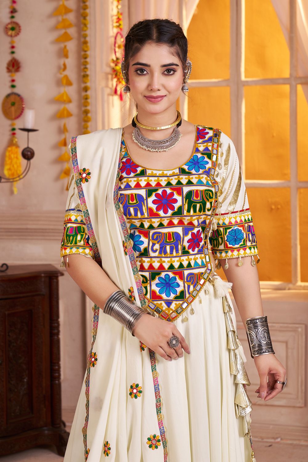 WHITE VISCOSE COTTON LEHENGA CHOLI WITH LAMPI BORDERING AND KUTCHI WORK