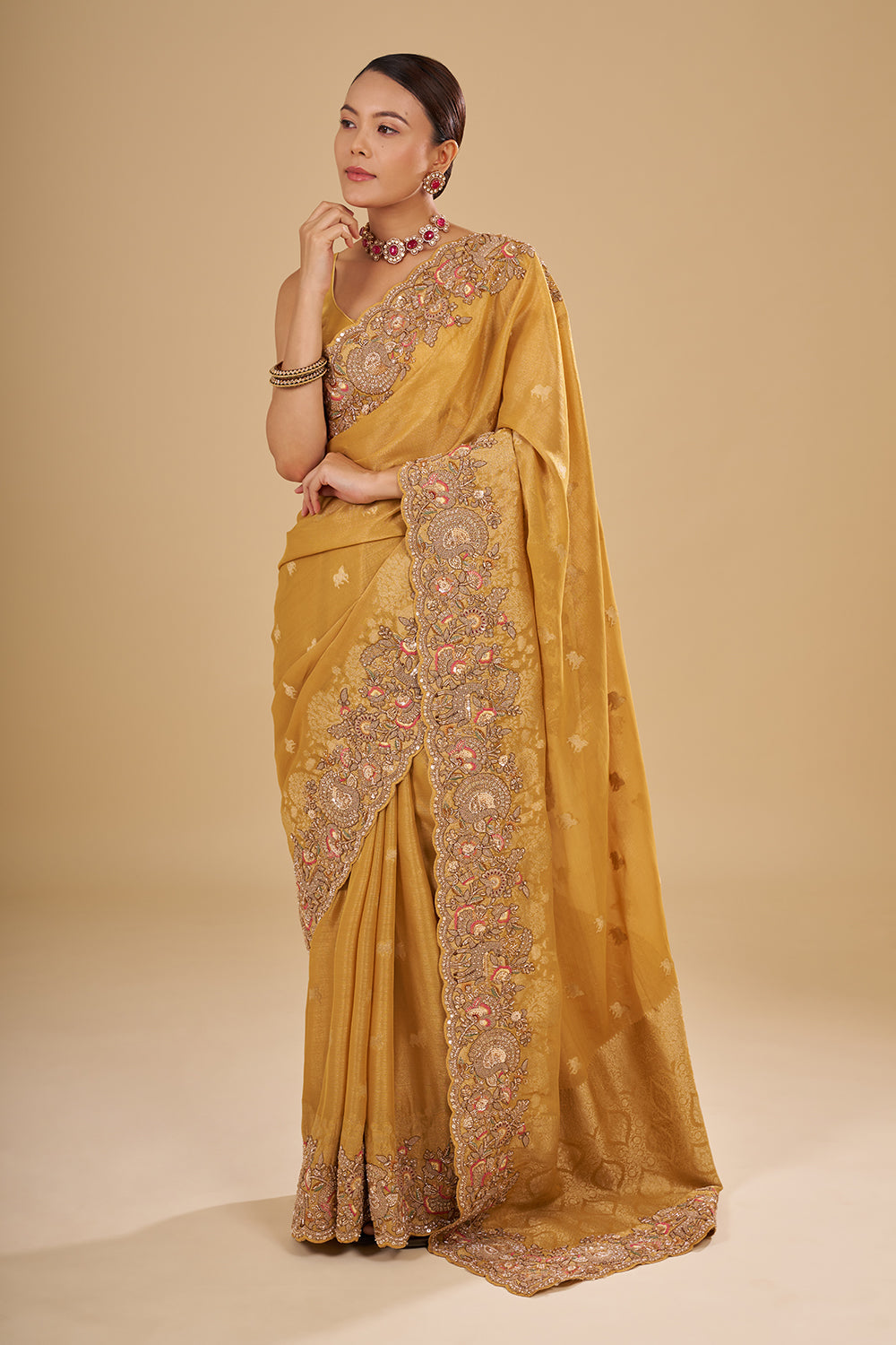 Antique Gold Tissue Saree with Zardozi Border and Unstitched Blouse