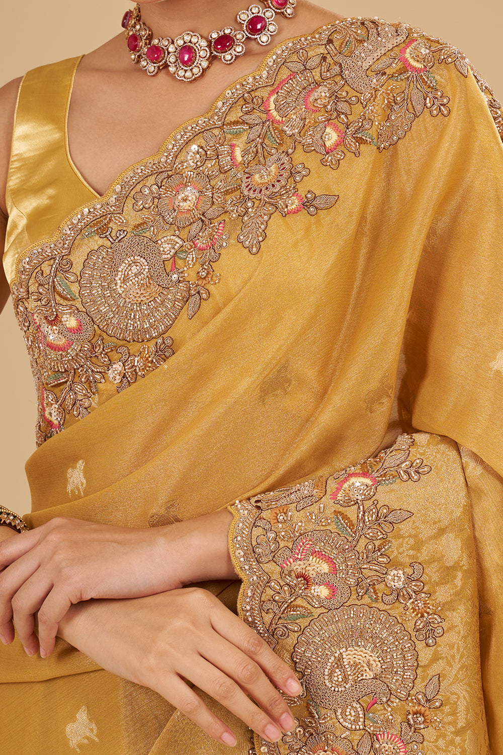 Antique Gold Tissue Saree with Zardozi Border and Unstitched Blouse